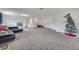 Expansive basement area, perfect for entertaining and relaxing, with a stylish black leather sectional at 4394 Devon Ct, Kissimmee, FL 34746