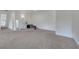 Large finished basement area ready to be customized, featuring neutral carpet and ample space at 4394 Devon Ct, Kissimmee, FL 34746