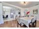 Open floor plan combines dining area and kitchen, featuring modern appliances and decor at 4394 Devon Ct, Kissimmee, FL 34746