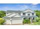 Charming two-story home featuring a three-car garage and well-maintained landscaping at 4394 Devon Ct, Kissimmee, FL 34746