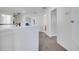 Hallway upstairs with views into the bedrooms and bathrooms on the second floor of the home at 4394 Devon Ct, Kissimmee, FL 34746