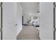 Bright main bedroom showcasing neutral walls, carpet floors, and a large window with natural light at 4394 Devon Ct, Kissimmee, FL 34746