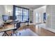 Comfortable home office space with hardwood floors and natural light at 4394 Devon Ct, Kissimmee, FL 34746