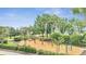 This beautiful neighborhood playground features mature trees and multiple play areas at 4394 Devon Ct, Kissimmee, FL 34746