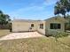 Fenced backyard with a patio, perfect for outdoor entertaining and relaxation at 520 Sumner Ave, Orange City, FL 32763