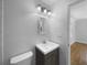 Updated bathroom with modern vanity and fixtures at 520 Sumner Ave, Orange City, FL 32763