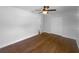 Bedroom featuring wood floor, ceiling fan and closet at 520 Sumner Ave, Orange City, FL 32763