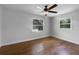 Inviting bedroom featuring natural light and hardwood flooring at 520 Sumner Ave, Orange City, FL 32763