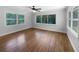 Bright bedroom with ample natural light from large windows at 520 Sumner Ave, Orange City, FL 32763