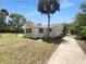A view of the side and back exterior of the home, showing the home's windows and structure at 520 Sumner Ave, Orange City, FL 32763