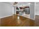 Open-concept layout with modern kitchen and dining area at 520 Sumner Ave, Orange City, FL 32763
