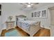 Bright bedroom with updated floors, natural light, and cozy decor at 5207 S Atlantic Ave # 225, New Smyrna Beach, FL 32169