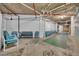 Community room with shuffleboard, chairs, and benches for relaxing at 5207 S Atlantic Ave # 225, New Smyrna Beach, FL 32169