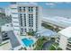 Oceanfront condo building showcasing beach views, a pool, and manicured grounds at 5207 S Atlantic Ave # 225, New Smyrna Beach, FL 32169