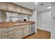 Kitchen featuring stainless steel appliances, granite countertops and views to living space at 5207 S Atlantic Ave # 225, New Smyrna Beach, FL 32169
