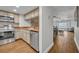 A kitchen with stainless steel appliances and a view of the ocean from the connected living space at 5207 S Atlantic Ave # 225, New Smyrna Beach, FL 32169