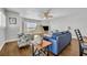 Inviting living room with beautiful seaside views, beach themed decorations and comfortable seating at 5207 S Atlantic Ave # 225, New Smyrna Beach, FL 32169