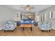 Open living room with ocean view, nautical decor, and easy access to the kitchen at 5207 S Atlantic Ave # 225, New Smyrna Beach, FL 32169