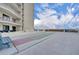 A shuffleboard court with ocean view on the recreation deck of a beachfront condo building at 5207 S Atlantic Ave # 225, New Smyrna Beach, FL 32169