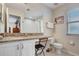 Bathroom showcasing granite countertop, white cabinets and tub/shower combo at 528 Terra Lago St, Davenport, FL 33897