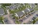 Aerial view of an apartment complex featuring ample parking and landscaping at 5635 Blue Shadows Ct # 3, Orlando, FL 32811