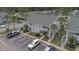 Aerial view of a well maintained apartment complex with ample parking at 5635 Blue Shadows Ct # 3, Orlando, FL 32811