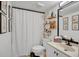 Bathroom with neutral decor featuring black hardware and a shower with curtain at 5635 Blue Shadows Ct # 3, Orlando, FL 32811