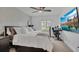 Bedroom showcasing a comfortable bed, modern decor, and a ceiling fan at 5635 Blue Shadows Ct # 3, Orlando, FL 32811