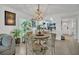Bright dining area with a round table and lots of houseplants at 5635 Blue Shadows Ct # 3, Orlando, FL 32811