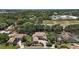 Sprawling estate home featuring a tile roof and manicured landscaping at 5683 Bassett Pl, Sanford, FL 32771