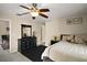 Comfortable bedroom with nice decor, a ceiling fan and easy access to the bath at 5683 Bassett Pl, Sanford, FL 32771