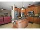 Well-equipped kitchen with stainless steel appliances, granite countertops, and abundant cabinetry at 5683 Bassett Pl, Sanford, FL 32771