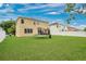 Expansive backyard with a trampoline and well-maintained lawn at 7469 Hunters Greene Cir, Lakeland, FL 33810