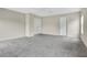 Spacious bedroom with neutral walls, carpet and walk-in closet at 7469 Hunters Greene Cir, Lakeland, FL 33810