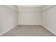Spacious walk-in closet with carpet and shelves at 7469 Hunters Greene Cir, Lakeland, FL 33810