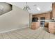 View of the kitchen, showing tile flooring and a kitchen island at 7469 Hunters Greene Cir, Lakeland, FL 33810