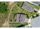Aerial view of the property showing the fenced-in yard and patio area at 816 Carmillion Ct, Groveland, FL 34736