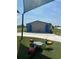 Community restrooms near playground and green space with blue accents at 816 Carmillion Ct, Groveland, FL 34736