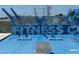 Public fitness area with exercise stations for step ups, lunges, and squats at 816 Carmillion Ct, Groveland, FL 34736