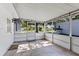 Enclosed patio that's great for entertaining or enjoying the outdoors while protected from the elements at 911 Ursula St, Ocoee, FL 34761