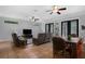 Spacious living room with tile floors, modern ceiling fans, and large windows for natural light at 1012 W New Hampshire St, Orlando, FL 32804