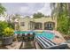 Relaxing pool area with patio furniture, perfect for outdoor entertaining at 1012 W New Hampshire St, Orlando, FL 32804