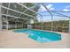 Inviting pool area featuring a sparkling swimming pool and screened enclosure at 10146 Pointview Ct, Orlando, FL 32836