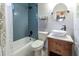 Updated bathroom features a vessel sink, soaking tub, and modern fixtures at 11 S University Cir, Deland, FL 32724