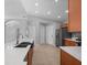 Kitchen features stainless steel appliances, quartz countertops, tile backsplash, and an undermount sink at 11218 Rouse Run Cir, Orlando, FL 32817