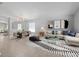 Spacious living room with stylish furniture and contemporary decor at 11218 Rouse Run Cir, Orlando, FL 32817