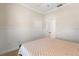 Bright bedroom with neutral walls, white trim, carpeted floors, and a closet at 11316 Rapallo Ln, Windermere, FL 34786