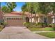 Charming single-story home featuring a tile roof, brick driveway, and lush landscaping at 11316 Rapallo Ln, Windermere, FL 34786