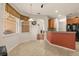 Bright breakfast nook with tiled floors next to kitchen and backyard views at 11316 Rapallo Ln, Windermere, FL 34786