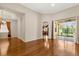 Spacious living area with gleaming floors, backyard access, and decorative lighting at 11316 Rapallo Ln, Windermere, FL 34786